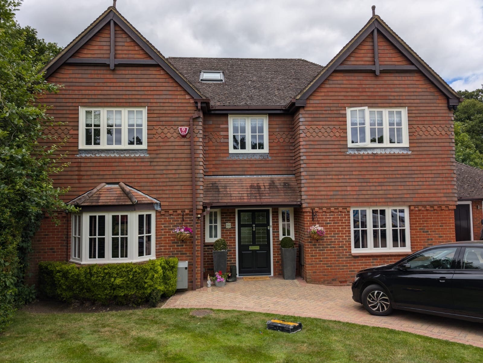 House with timber casement windows from Hadham Group